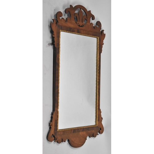 309 - A Fret Cut Mahogany Georgian Style Wall Mirror, 81x47cms