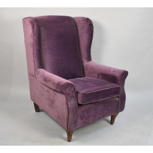 517 - A Modern Upholstered Wing Armchair