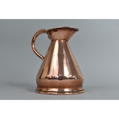 63 - A Vintage Copper Quart Jug, 20cms High