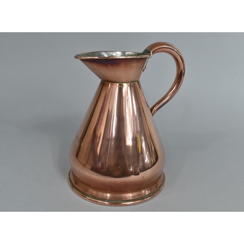 63 - A Vintage Copper Quart Jug, 20cms High