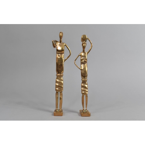 109 - A Pair of Highly Polished Bronze Figures of African Tribespeople, 20cms High