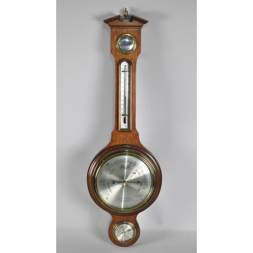 118 - A Mid 20th Century Wheel Barometer with Thermometer by Comitti of London, 72cms High