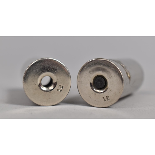 167 - A Pair of Silver Plated Twelve Bore Shotgun Cartridge Bases