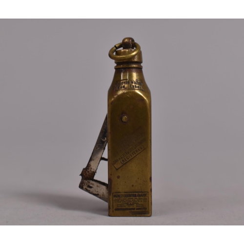 177 - A Vintage Cigar/Cheroot Cutter in the Form of a Johnny Walker Old Highland Whisky Bottle