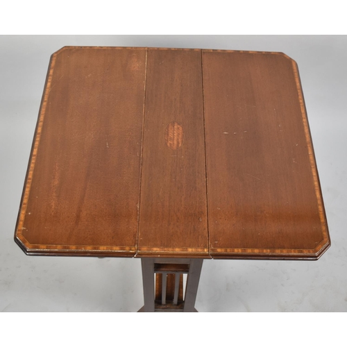 70 - An Edwardian Mahogany Drop Leaf Sutherland Table, 56cms Wide