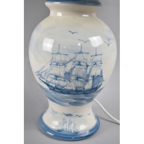 100 - A Modern Blue and White Ceramic Vase Shaped Table Lamp and Shade Decorated with tall Ships, 56cms Hi... 