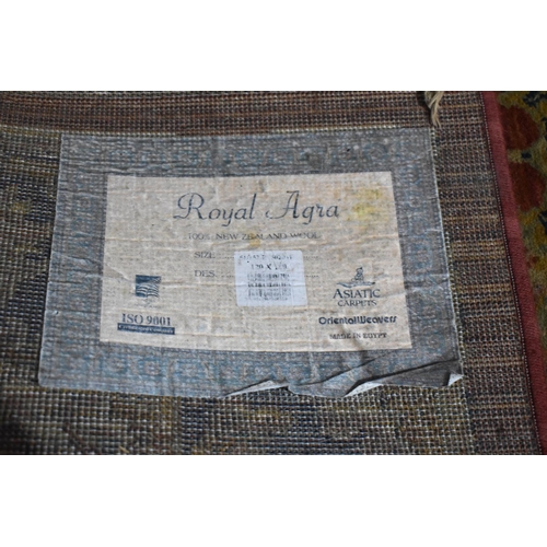 604 - A Vintage Patterned Woollen Rug, 178x120