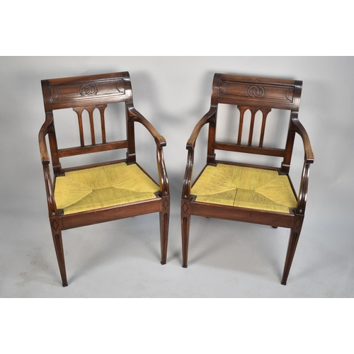 609 - A Pair of Rush Seated Mahogany Framed Armchairs on Square Tapering Supports