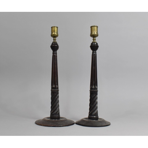 61 - A Pair of Edwardian Turned Wooden Candlesticks with Brass Holders, 33cms High