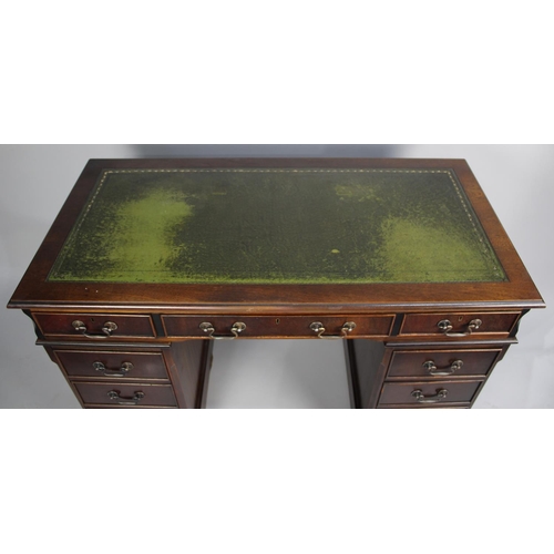 103 - A Mid 20th Century Knee Hole Writing Desk with Tooled Leather Top, 121cms Wide