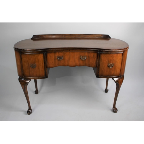 125 - A Mid 20th Century Walnut Serpentine Fronted Writing Desk or Dressing Table with Long Centre Drawer ... 