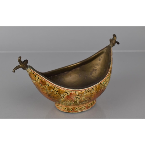 386 - A Bronze Kashmiri Kashkul or Beggar's Bowl of Usual Boat Form decorated in Lacquered Polychrome Enam... 