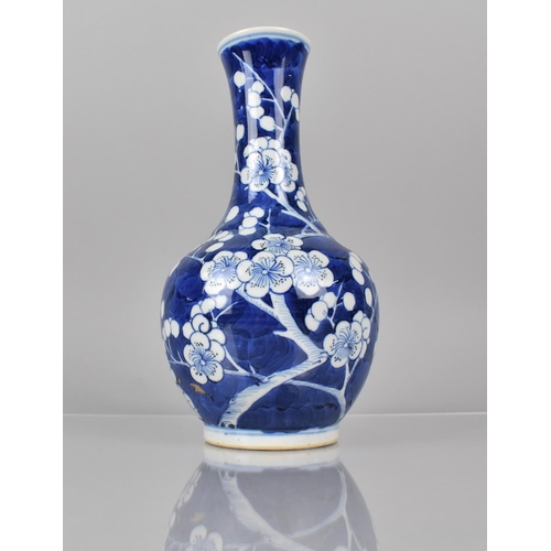 377 - A 19th Century Chinese Blue and White Prunus Pattern Vase of Bottle Form with Flared Neck, Four Char... 