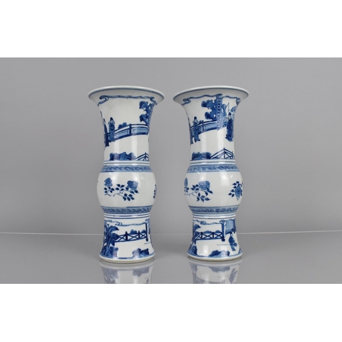 368 - A Pair of Chinese Blue and White Yen Yen Vases, Decorated with Seated Officials, Attendants and Scho... 