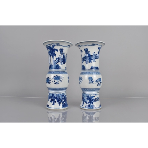 368 - A Pair of Chinese Blue and White Yen Yen Vases, Decorated with Seated Officials, Attendants and Scho... 