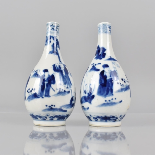 365 - A Pair of 19th Century Chinese Blue and White Bottle Vases decorated with Dignitaries and Figures in... 