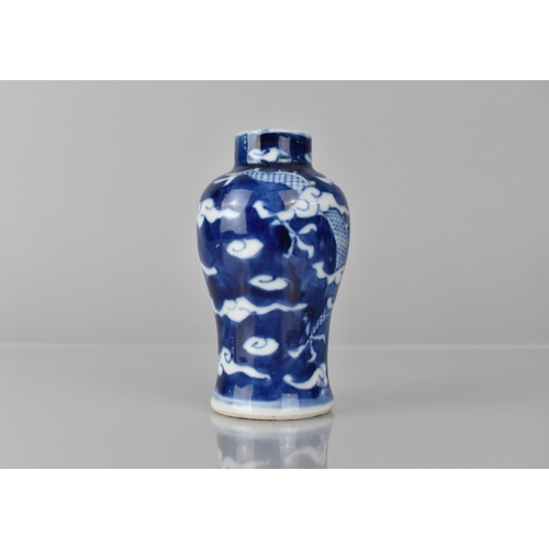 361 - A Small Chinese Blue and White Porcelain Vase of Baluster Form decorated with Dragon Chasing Flaming... 