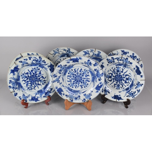 360 - A Set of Seven 18th/19th Century Chinese Porcelain Blue and White Plates decorated with Central Flor... 