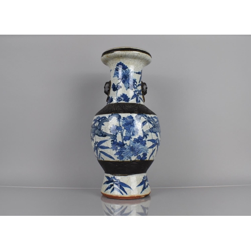 347 - A 19th Century Blue and White Crackle Glazed Vase decorated with Dragons Amongst Foliage an Flowers,... 