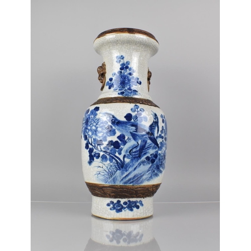 345 - A Large Chinese Blue and White Crackle Glazed Vase Decorated with Birds in Blossoming Branches, Oxid... 