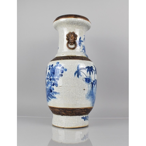 345 - A Large Chinese Blue and White Crackle Glazed Vase Decorated with Birds in Blossoming Branches, Oxid... 