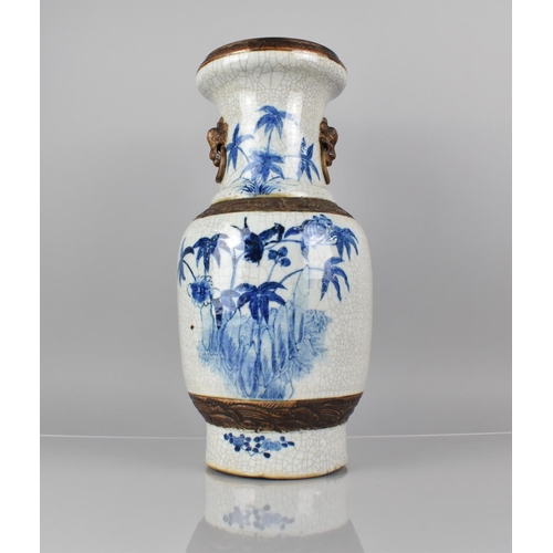 345 - A Large Chinese Blue and White Crackle Glazed Vase Decorated with Birds in Blossoming Branches, Oxid... 