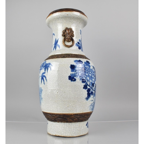 345 - A Large Chinese Blue and White Crackle Glazed Vase Decorated with Birds in Blossoming Branches, Oxid... 