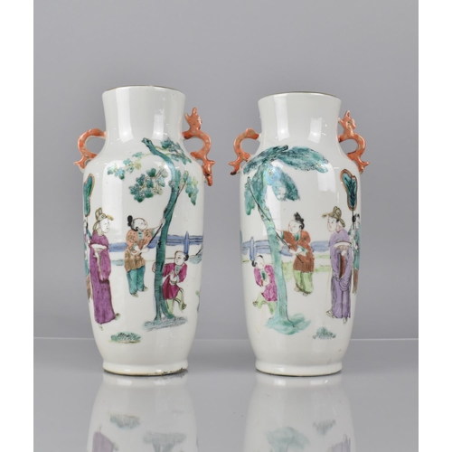 335 - A Pair of 19th Century Chinese Porcelain Vases decorated in the Famille Rose Palette with Robed Dign... 