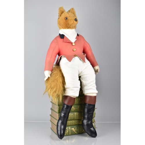 115 - An Early /Mid 20th century Anthropomorphic Soft Toy in the Form of a Seated Fox wearing Hunting Atti... 