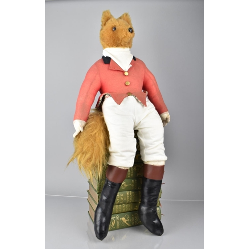 115 - An Early /Mid 20th century Anthropomorphic Soft Toy in the Form of a Seated Fox wearing Hunting Atti... 