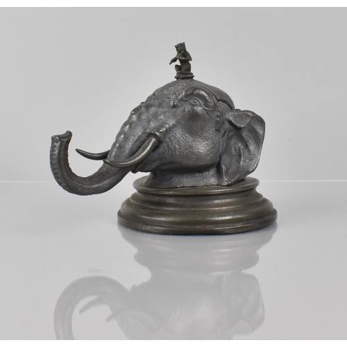 81 - A Victorian Pewter Desk Inkwell in the Form of an Indian Elephant Head with Flute Playing Monkey Fin... 