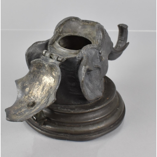 81 - A Victorian Pewter Desk Inkwell in the Form of an Indian Elephant Head with Flute Playing Monkey Fin... 