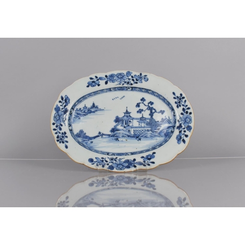 357 - A 19th Century Chinese Blue and White Charger Decorated with River Village Scene and Floral Garland ... 