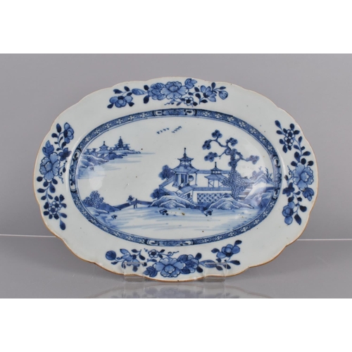 357 - A 19th Century Chinese Blue and White Charger Decorated with River Village Scene and Floral Garland ... 