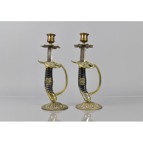 135 - A Pair of 19th Century 1889 Pattern Prussian Sword Hilts, Now Converted to Candlesticks, 27cms High