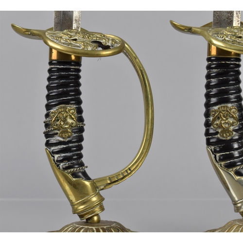 135 - A Pair of 19th Century 1889 Pattern Prussian Sword Hilts, Now Converted to Candlesticks, 27cms High