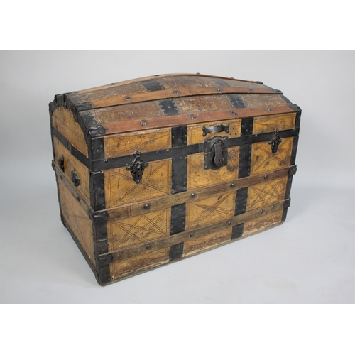 116 - A Late 19th Century Dome Top Travelling Trunk with Iron and Wood Banding, 87cms Wide