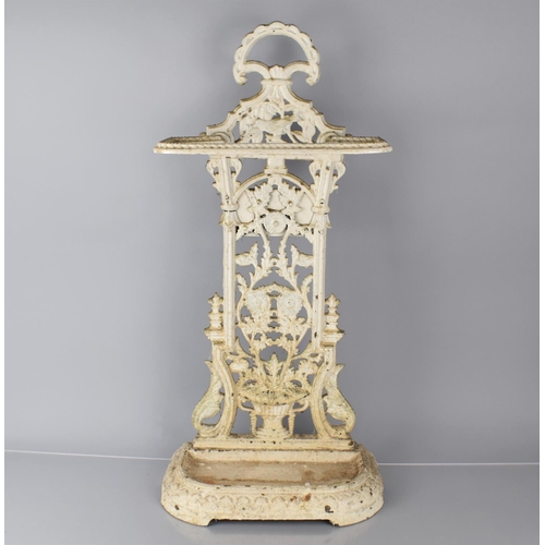 74 - A Late Victorian White Painted Cast Iron Stick Stand with Back Support decorated with Flowers and Ur... 