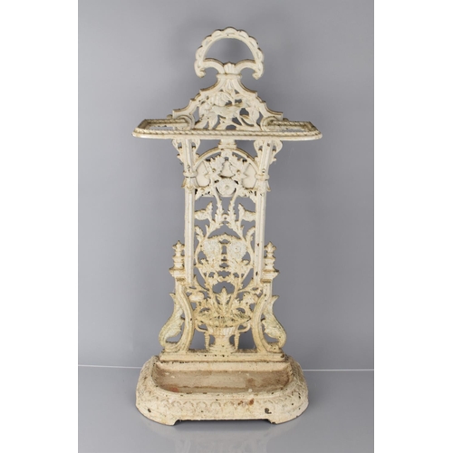 74 - A Late Victorian White Painted Cast Iron Stick Stand with Back Support decorated with Flowers and Ur... 