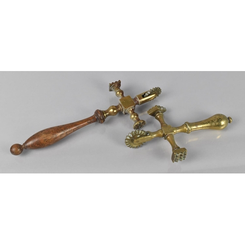 71 - A Late 19th/Early 20th Century Brass Pastry Crimper/Jigger with Turned Wooden Handle together with a... 