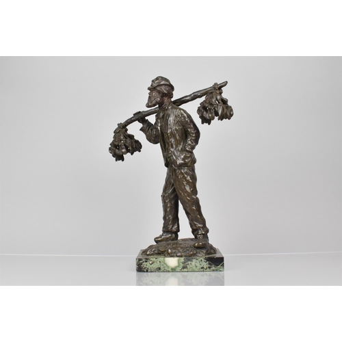 106 - Charles Emile Jonchery (French 1873-1937) A Bronze Figure of Bearded Gent Carrying Two Bunches of Mi... 