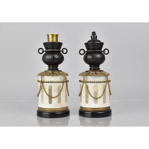 101 - A Pair of French Bronze and Marble Garnitures of Cylindrical Form with Two Handled Vase having Rever... 