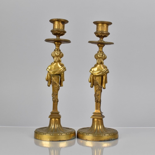 97 - A Pair of French Gilt Bronze Candlesticks, The Supports having Drip Trays Surmounting Classical Maid... 