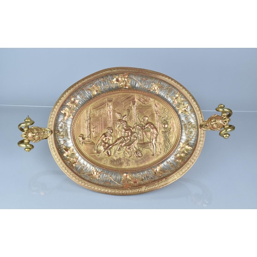 82 - A French Oval Brass and Copper Two Handled Table Centre Decorated in Relief with Venus and Attendant... 