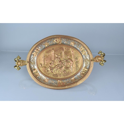 82 - A French Oval Brass and Copper Two Handled Table Centre Decorated in Relief with Venus and Attendant... 