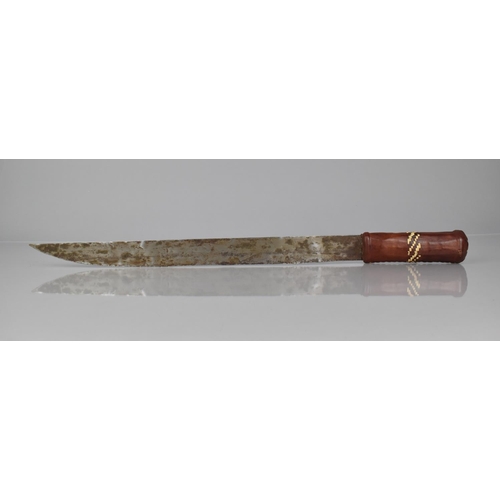 150 - A Leather Handled Machete with Animal Skin Scabbard, Possibly African Tribal