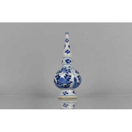 372 - A Chinese Porcelain Sprinkler Vase of Bottle Form decorated with Arched Panels of Blossoming Flowers