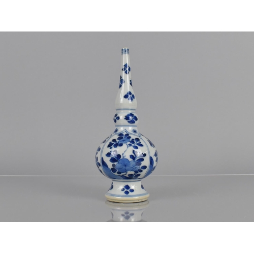 372 - A Chinese Porcelain Sprinkler Vase of Bottle Form decorated with Arched Panels of Blossoming Flowers