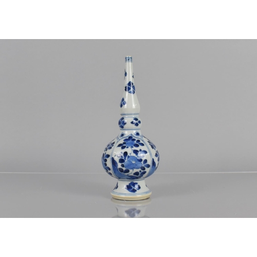 372 - A Chinese Porcelain Sprinkler Vase of Bottle Form decorated with Arched Panels of Blossoming Flowers