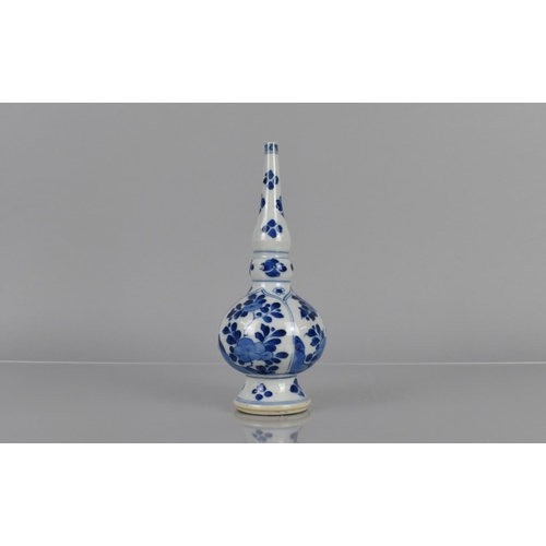 372 - A Chinese Porcelain Sprinkler Vase of Bottle Form decorated with Arched Panels of Blossoming Flowers